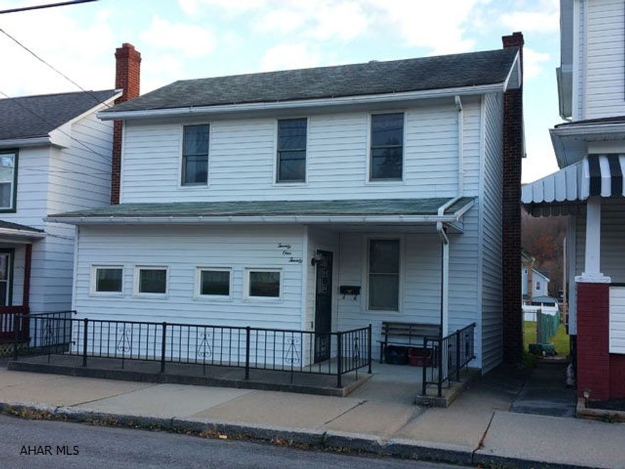 2 1/2 story, 4 bedroom home with 2 1/2 baths. First floor laundry and bathroom. Modern kitchen and bath. 2 enclosed porches. 1 car garage with loft.