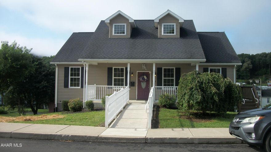 Meticulously maintained home for sale.  It is currently being used as an office. Sold as is and furnished. Built in 2014 and conveniently located on Lower Main Street, this property offers both on street and off street parking.  Entering the main level, you walk into a great room with cathedral ceilings that be a large living room and dining room.  The main level bedroom has an en suite bathroom.  
The kitchen features ceramic tile flooring, cherry cabinets, a range, refrigerator, microwave, dishwasher and an eat-in area.  The rear deck is a great place to sip your morning coffee.  Also located on the main level is an ADA compliant 1/2 bathroom. The lower level features ground level access to the outside, a wide staircase, and an open concept with plenty of room for additional  bedrooms to be built.  The lower level also contains a mechanical room, an ADA compliant bathroom, a laundry room and a storage room.  The parking lot to the rear of the building will easily hold six vehicles.  The building is set up for high speed internet, has a 200 amp electrical service, an alarm system and a heat pump to keep you comfy all year round. Come take a look, you may just find the perfect location and building you've been looking for.  Square footage and acreage were taken from the Bedford County tax records; buyer to verify.