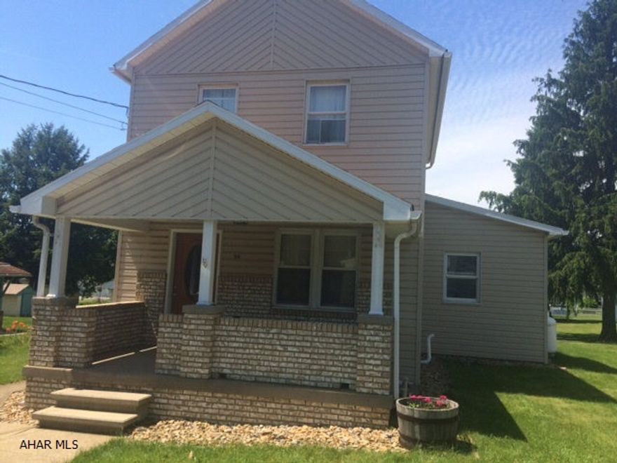 2 story brick & vinyl sided 2BR home w/ 1 car detached garage. Homer City Schools