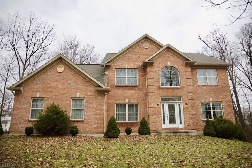 This beautiful, spacious, well-built home has so much to offer the discerning buyer.  With 4 large bedrooms and 2-1/2 baths, this house is perfect for the growing family.  Private office area, large open basement which could be easily finished and accesses the back yard through lovely French doors, large patio would be perfect for entertaining, first floor laundry, 2 car garage, within walking distance of the community park/picnic area... all located on 1.3 acres on a quiet cul-de-sac.  Priced to sell quickly!  Don't miss it!