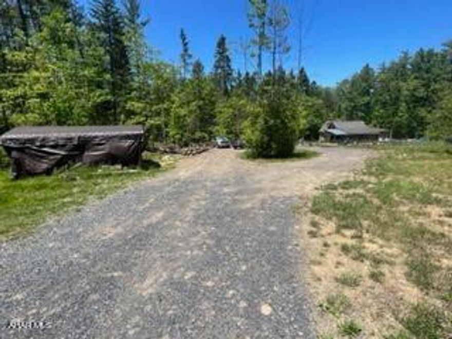 If you have been searching for that quite nice place away from the city, this prior hunting cabin turned into a family home along reservoir road, Hollidaysburg area could be your perfect new home. This spacious two-story home is sitting on 6.15 acres with 3 large bedrooms and 1.5 baths.  It features a versatile and flowing floor plan. New roof put on a few months ago and sand mound installed. Interior has two new air and heat pump systems installed. Living room has pellet stove. This home is awaiting a new owner to give the finishing touches.