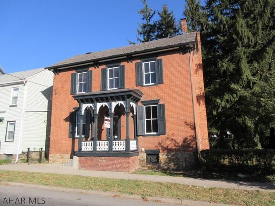 Historic Hollidaysburg brick charmer completely updated throughout. Features fabulous eat-in kitchen with beautiful new quartz countertops and backsplash plus all new stainless steel appliances. Large living room and formal dining room with freshly refinished hardwood floors.  New main bathroom and first floor half bath with beautiful tile finishes throughout. 3 large bedrooms with relaxing second floor balcony, all new gas furnace with central air, huge backyard with outdoor kitchen and ample off street parking in rear alley.