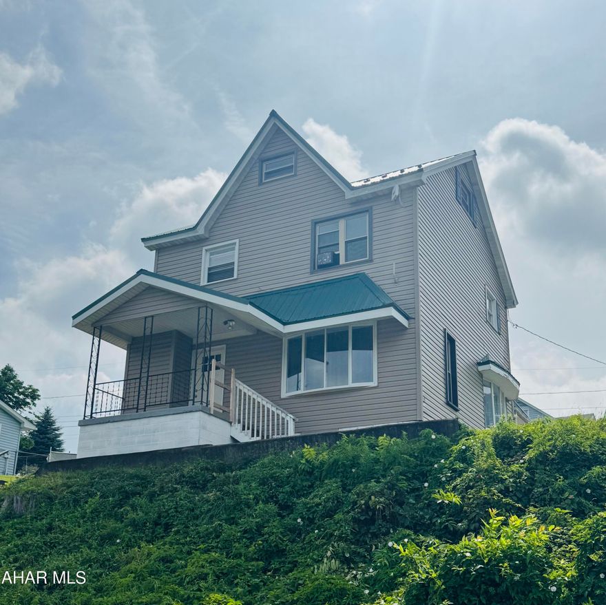 Welcome to this completely remodeled home in Highland Park with extra lot and garage! Step into this stunner and wait until you see the view of the city! Kitchen complete with new cabinetry and granite counters. New flooring throughout. Spacious dining and living rooms. Bath has tile surround in tub with rain showerhead! Need extra space or bedroom? No worries here with the finished attic space!  Call listing agent to tour!