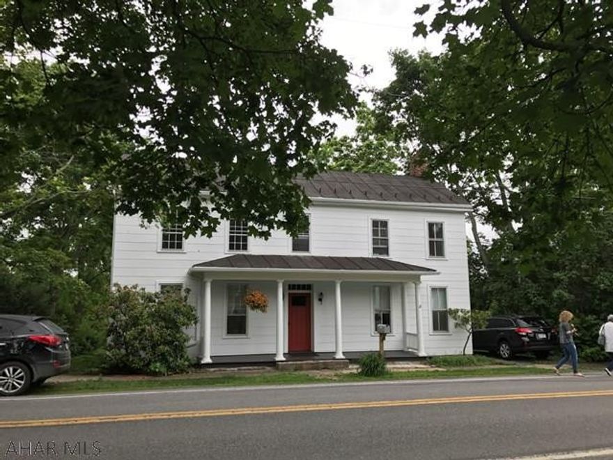 This beautifully restored 5 bedroom colonial home with clapboard siding has a charm that could easily inspire an artist. The centrally located foyer with its lovely staircase opens onto the living room and kitchen area. Enjoy and evening coffee on the covered porch adjacent to the kitchen which overlooks the lovely backyard. A main floor laundry and large master bedroom adds great convenience. A private 2 story or guest retreat attched to the back of the home is an added bonus. Located in historic Bedford County. Exceptional value!