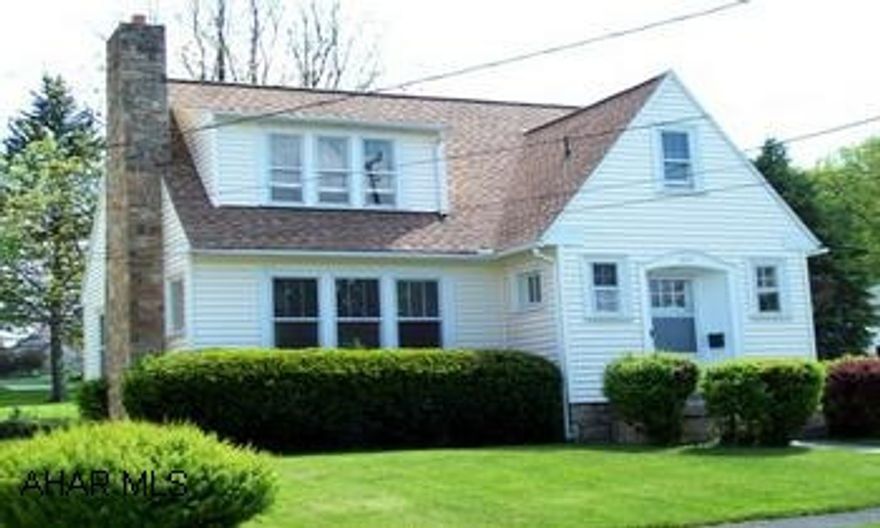 See Comments Nothing quite as charming as a 1930's home with most original woodwork, doors, doorknobs, some wood flooring, woodburning fireplace, arched doorways!  This home has newer carpeting, some newer light fixtures, newer interior paint, newer alley door, newer furnace and roof.  Really workable solid cherry kitchen with plenty of cabinet space and appliances stays.  Fall in love with the original kitchen nook with table and benches!  Also a formal dining room!  Half bath on first floor, wood floors up, all bedrooms and full bath up! Upgraded electrical. u Just a sweet buy!