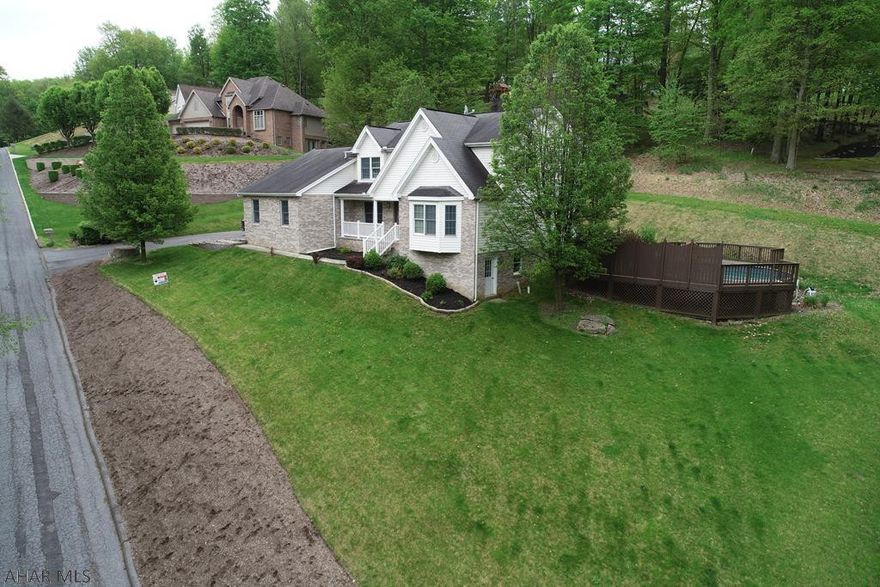 Enjoy this recently renovated custom built contemporary home in a wonderful quiet neighborhood overlooking the charming town of historic Bedford that will Impress guests immediately with the home's grand two story, light filled great room which opens onto fabulous kitchen with huge sit up granite center island.  An owner's suite is conveniently located on the main floor in a private wing.  Enjoy your morning coffee in the home's sunroom as you enjoy the peace and solitude of the home's location.  Three  bedrooms share a bathroom on the second level which overlooks the great room.  One has to see the impressive renovations made to this home within the last year to really appreciate this fabulous home.