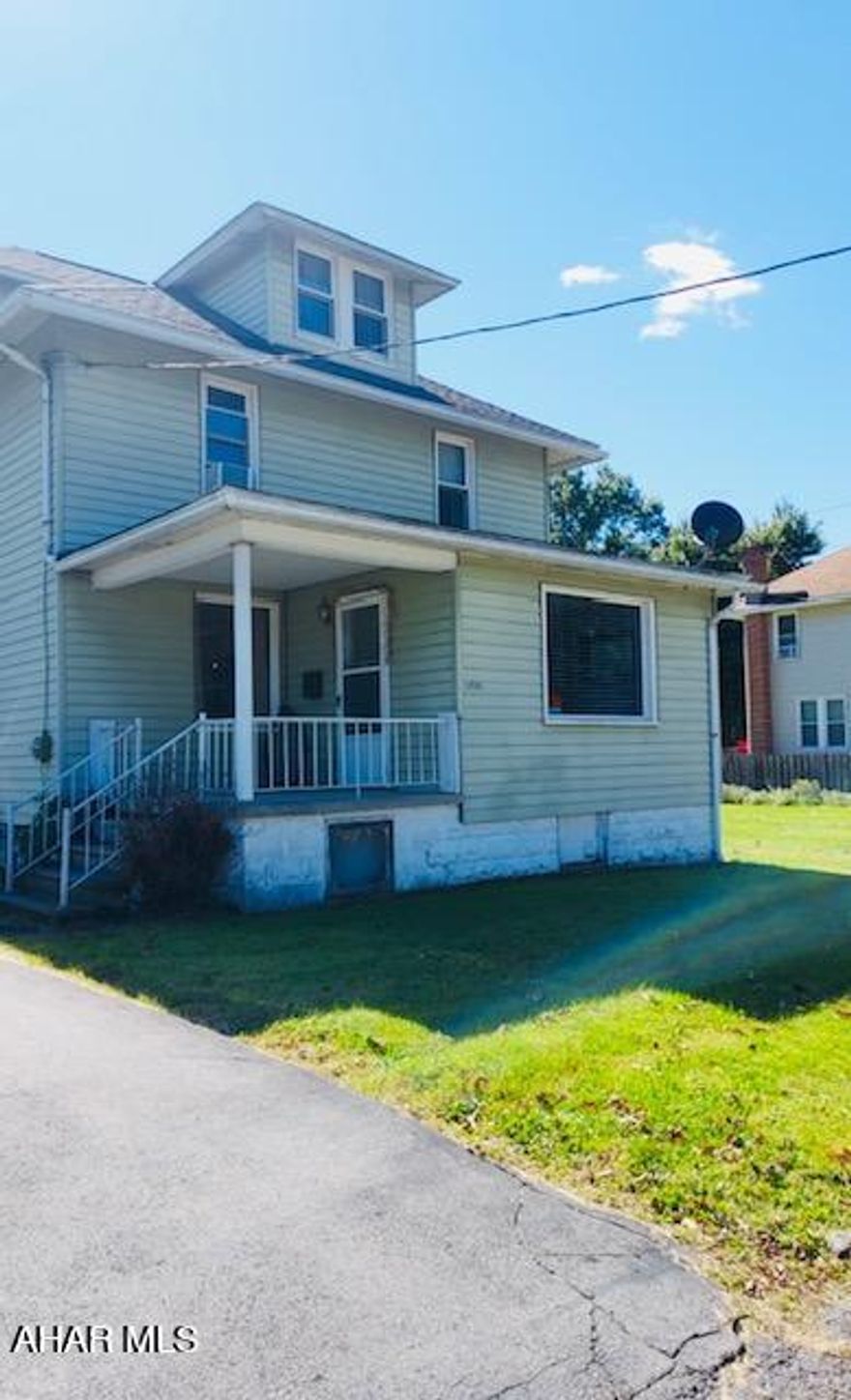 Large two and a half story house on .3 acre of land, carport and garage, nice hardwood floors . Upstairs could use a little tlc. A great house for the price