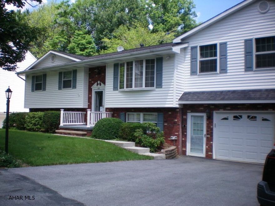 Lovely home in meticulous condition. Totally remodeled plus a large master suite addition. Wonderful finished basement with full kitchen, and bath. Fireplace in family room, a bonus room and a 4 season florida room. 7 zones for heat, well insulated for low heating bills. Large oversized garage and work shop. Back yard with a view and a great neighborhood, conveniently located.