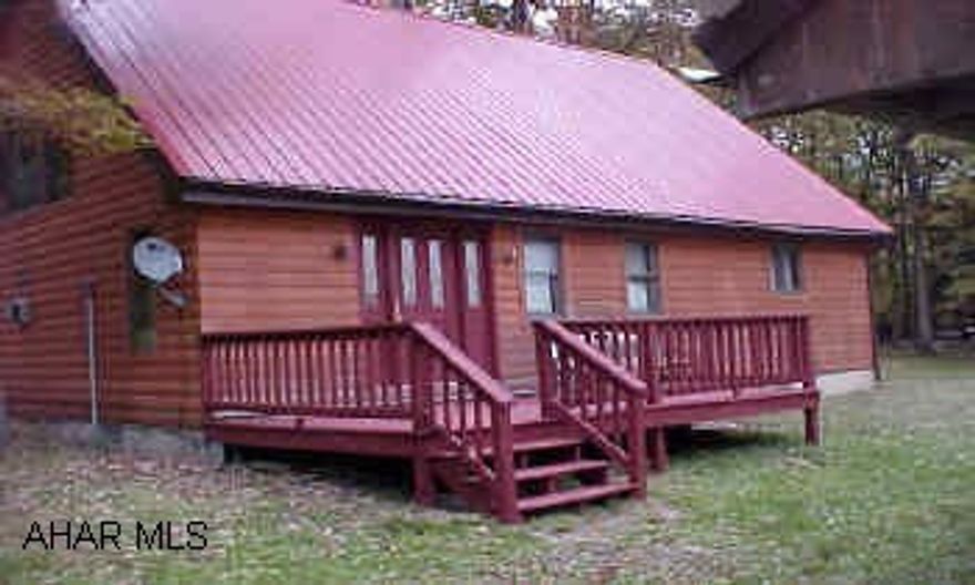 Get away home!  48+ surveyed acres; (7-10 acres cleared) Taxes $650/yr - 2 streams; 1/4 acre pond; foot bridge; log cabin; 20x60 pavilion; 16x16 shed; fish hatchery; Septic System needs repaired Does Not meet Code: Call Judy @  814-946-9355 vm 335 48 + surveyed Acres - 2 streams, 1/4 acre pond; pavilion, shed; dwelling, Peace and Quiet!  Well, Septic System needs repaired - Does NOT meet Code.  Log sided cabin 28 x 38 in size, cathedral ceiling, hardwood floor; propane fireplace - stove; kitchen ceramic tile with oak cabinets. fish hatchery;   Must See!  Call Judy at  81-946-9355  vm 335