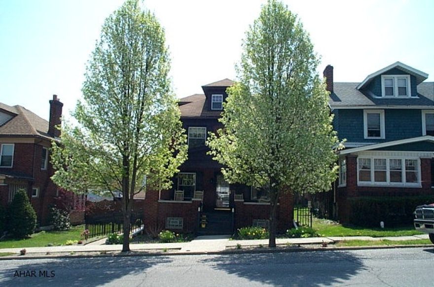 Classic Brick 2 story with complete remodel package. Stunning attention to detail. From tin ceiling in kitchen, staircase woodwork, natural wood floors, completely finished basement, attic bedroom. Artisan quality to the fit and finished.