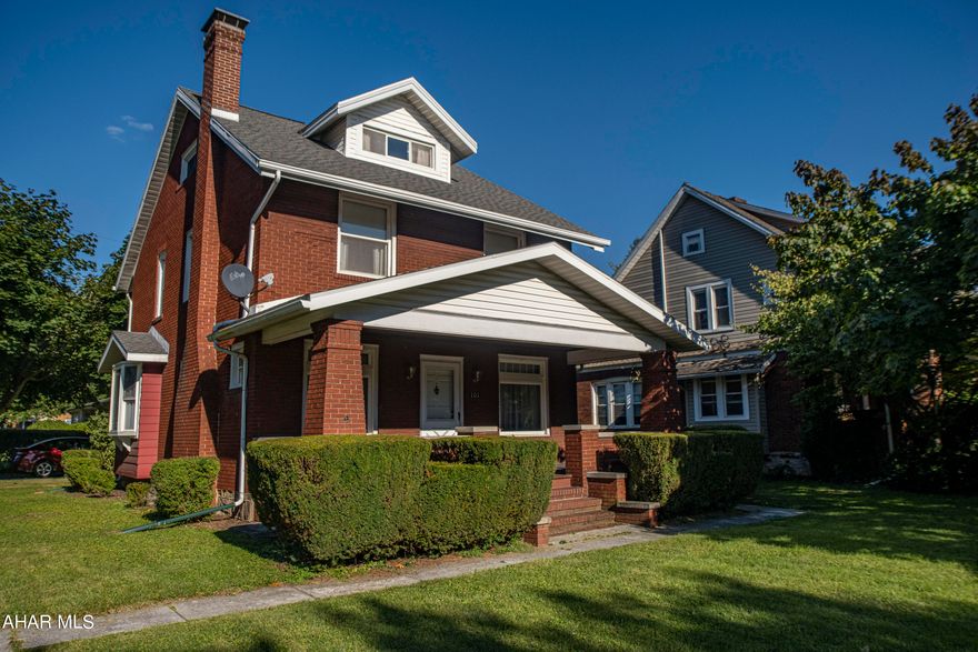 LOCATION LOCATION LOCATION! Beautiful brick home located close to many restaurants, shopping and I99. The first floor offers a large, spacious living area with a gas fireplace, formal dining room and an open kitchen with an adorable breakfast nook and a half bath. Upstairs you will find three bedrooms and a full bath. Walk up attic could be used as a fourth bedroom or additional storage space. This home features AMPLE closet space! Large two car garage and off street parking. Don't miss out on the opportunity to call this home yours!