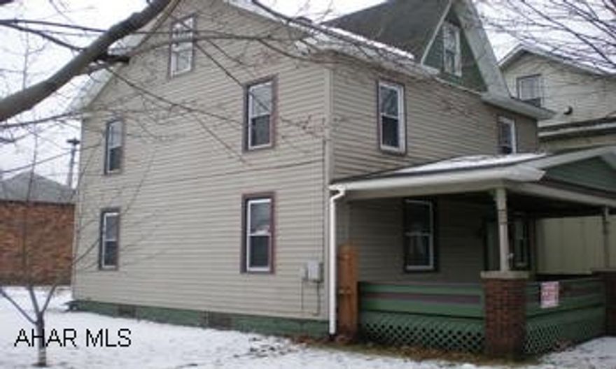 Great starter home! 3-4 bedrooms, 1.75 baths. Needs some tlc.  2 car brick garage. Sold as is.