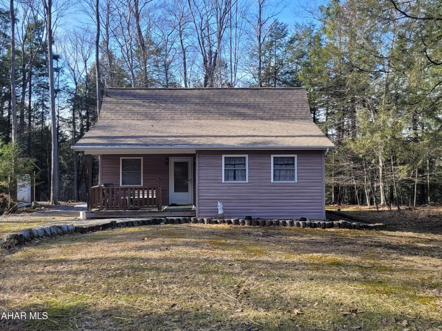 Whether you are looking for a private getaway or downsizing, this cabin is worth a look.  Whether you prefer a first floor bedroom or sleeping in the loft this is where you want to be.  Gather together in the open kitchen / living room area where you can open the sliding door and extend out on the large covered deck.  Or relax and warm up downstairs in front of the propane wall heater.  Sit and play cards or your favorite game or make use of the adjacent bar.  
Outside you can tell stories around the fire pit while cooking smores.  Park your golf cart or quad in the garage shed.  
There is plenty of room to park your boat so you don't have to haul it from home.  
Glendale Yearound is a gated community with a clubhouse, outdoor pool, tennis / basketball / volleyball courts, playgrounds, dog park, pavilions and more. 
Adjacent to Prince Gallitzin State Park / Glendale Lake where you can fish and boat or go for a swim.  Glendale Yeaeround is located six miles from Rock Run ATV Park.