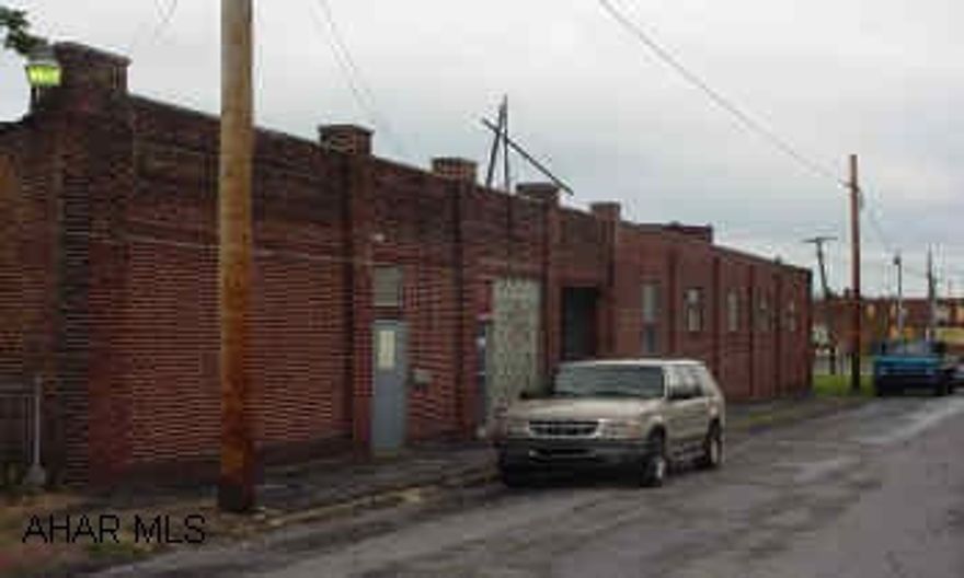 1st bld 8328 gross square feet, 2nd bld 1680 gross square feet. Public utilities available. Buildings have drive-in and dock high access. Ceiling heights range from 14' to 20' clear. 800 sq.ft. of office space. Year built 1950/1980.Exterior Brick/metal    2309-17 Union Ave., 2305 Union Ave., 2310 8th Ave. Owner financing possible. 800 square feet of office space.