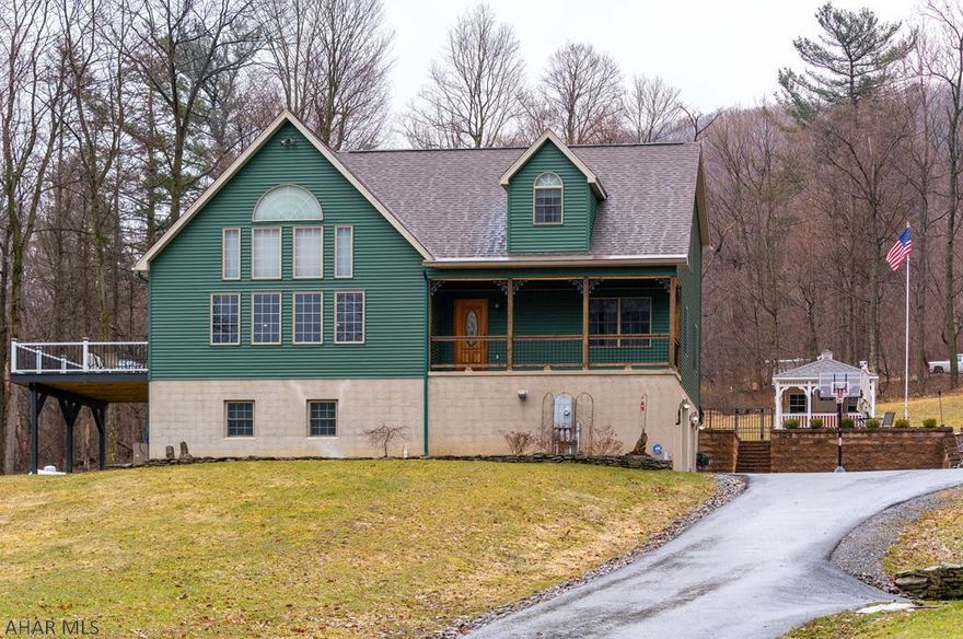 If you are looking for a home that will make you feel like you are on vacation everyday....This is it! Private,meticiously kept 2 story with 3 bedrooms & 3 full baths & so much more! The kitchen boasts beautiful Maple cabinets & granite countertops with an island. Over 4000 Sq. Ft. of open living space with storage space galore. New 16x20 trex deck built in 2018. Relax in the In ground pool with pool house & hot tub. Listen to the sound system throughout the house & the pool area. The home itself has a 1 car garage there is also a separate 3 car garage with a beautiful apartment above, and yet another separate 2 car garage. There are also 2 storage sheds. The whole property has a back up generator.  This is all situated on 31.43 acres w/plenty of wildlife & hunting.  Survey recently done.