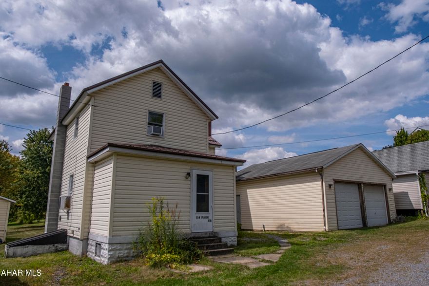 114 Park Rd - Hastings, PA. Welcome to this charming 3-bedroom, 2-bath home on a 0.28-acre double lot in Hastings. The property offers spacious rooms throughout, a level yard perfect for outdoor activities, and a detached garage for extra storage or parking. Recent updates include a brand-new roof.