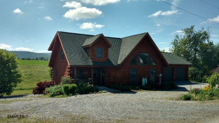 Georgous custom built log home in Woodbury. This home features 6x8 exterior treated logs with log finish interior, open floor plan, and superior wall foundation. Home is set up with all main features on the first floor with handicapped accessibility. Master bedroom features walk in closet and door to the 27ft covered deck. Loft was used as large bedroom for guests, stretching over 20 ft long with 8 foot ceilings, easily able to divide to make additional bedrooms. The basement features a partially finished room for entertaining, or guest bedroom along with a bathroom. There is a large workshop with a garage door in the basement allowing easy storage of yard equipment, motorcycles or atvs. The attached 2 car garage hosts a walk in pantry and doggie door to the exterior dog kennel. Call today