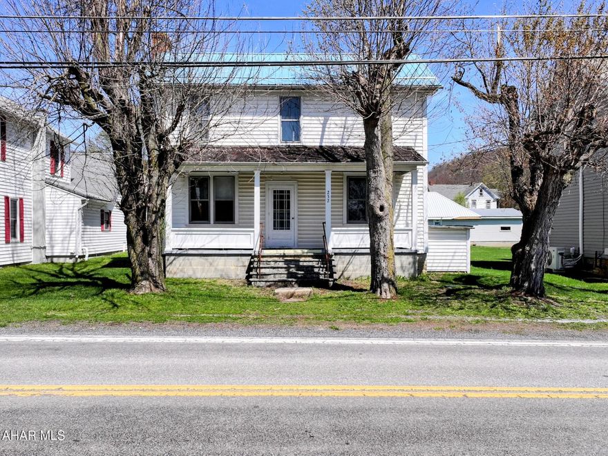 This Home was Lovingly named '' Osterburg Ski Lodge'' it was used for families from different areas to meet up during the winter months and enjoy sking at Blue Knob. The bedrooms have multiple bunkbeds as well as the walk-up attic has more beds for sleeping room. One bathroom on the first floor, and another on the second floor. Large kitchen for everyone to join in the cooking duties. Cupboards are full of dishes ,glasses, pots and pans and much more. Two large tables pushed together in the dining room make for lots of eating space. Living room is furnished and has an inviting fireplace to warm up after a day of outside activities , All items that are in the house are included in the sales price. Heat is Oil F/A has public water and sewer.  This could be a perfect Home, Getaway, Arbnb or a Rental. Financing is Cash or Conventional only.  Use your imagination on this one!