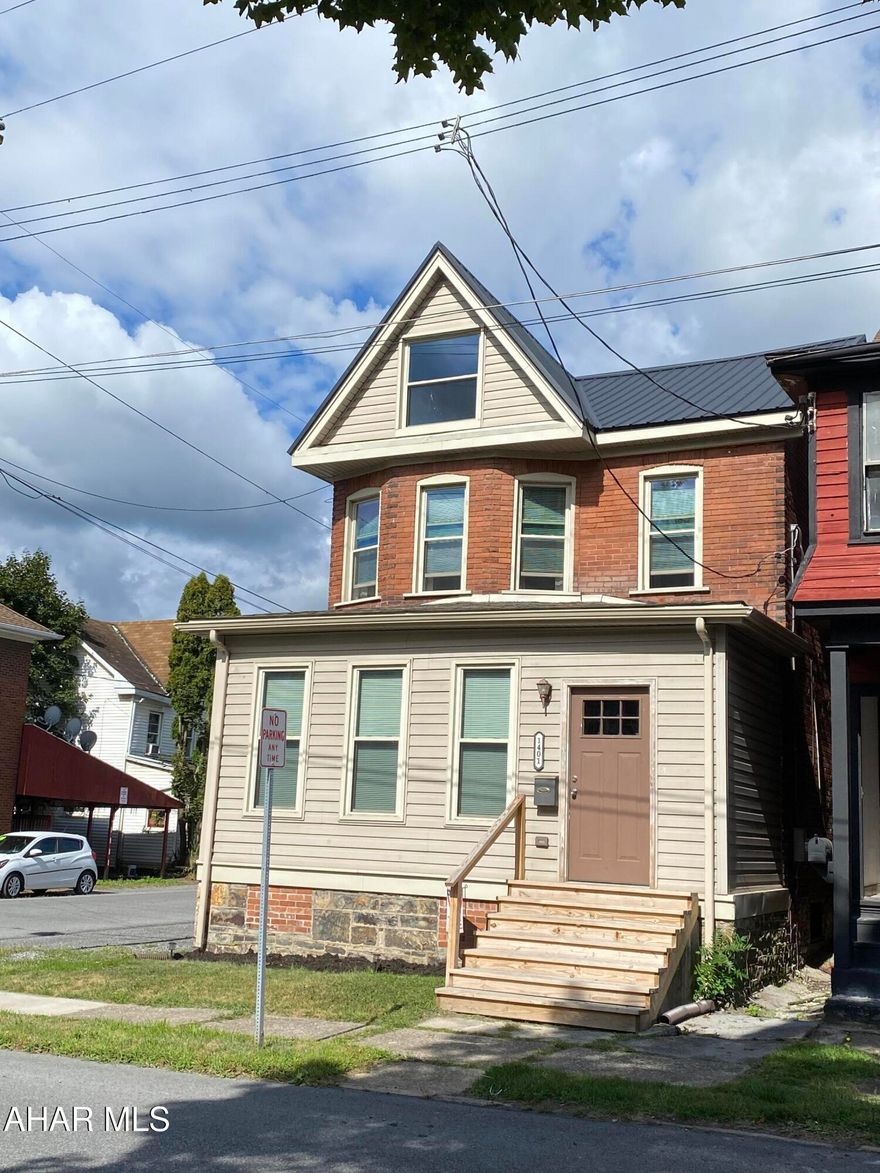 Welcome to this beautifully updated 4-bedroom, 2-bath home situated on a desirable corner lot with a fully fenced yard. This property offers both charm and convenience, featuring a garage for off-street parking and a welcoming enclosed front porch. Inside, you'll find a spacious layout with a first-floor laundry, a newly updated kitchen with modern finishes, and two stylishly remodeled bathrooms. The home also boasts new flooring throughout, a new roof, newer windows and a newer furnace-giving you peace of mind for years to come. Move-in ready and thoughtfully updated, this home is the perfect blend of comfort and functionality.