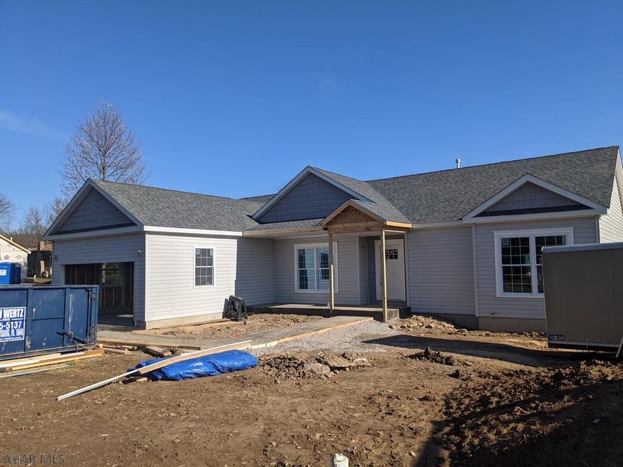 New construction! Ranch home, one story living in Old Town Village. This home features granite countertops and upgraded finishes including vinyl plank and ceramic tile flooring. Open concept eat-in kitchen with farm sink.  Included Frigidaire appliances and GE range hood. Fireplace and incredible master bedroom with en-suite bath and walk-in closet. Solid core doors throughout.  Includes 2 car garage. Note - home will have grey siding with flint gable siding for contrast. Seller is a licensed agent. Square footage is approximate and may be adjusted slightly for lot setback requirements. Taxes are for the lot and will be adjusted at final completion.  Pictures of finishes and upgrades under listing pictures. Physical samples of building materials are available at brokerage office.