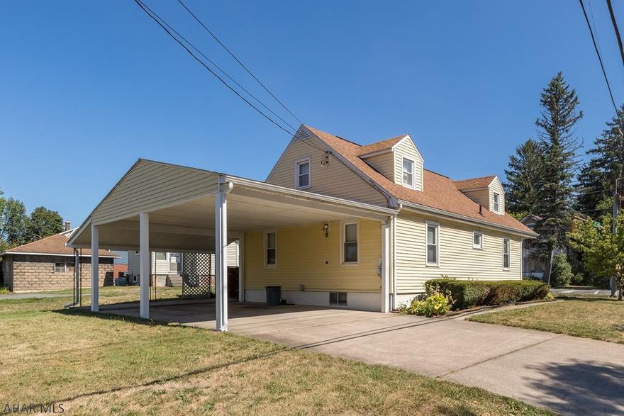 Convenient Location - Close to shopping & school!  This 4 Bedroom home has updated kitchen, dining room & large living room, two 1st floor Bedrooms & Full Bath. Second floor offers 2 additional Bedrooms, 1/2 Bath, plenty of storage - hardwood floor.  Basement has partially finished room - good for Play Room or Family Room, work shop.  Carport & shed.