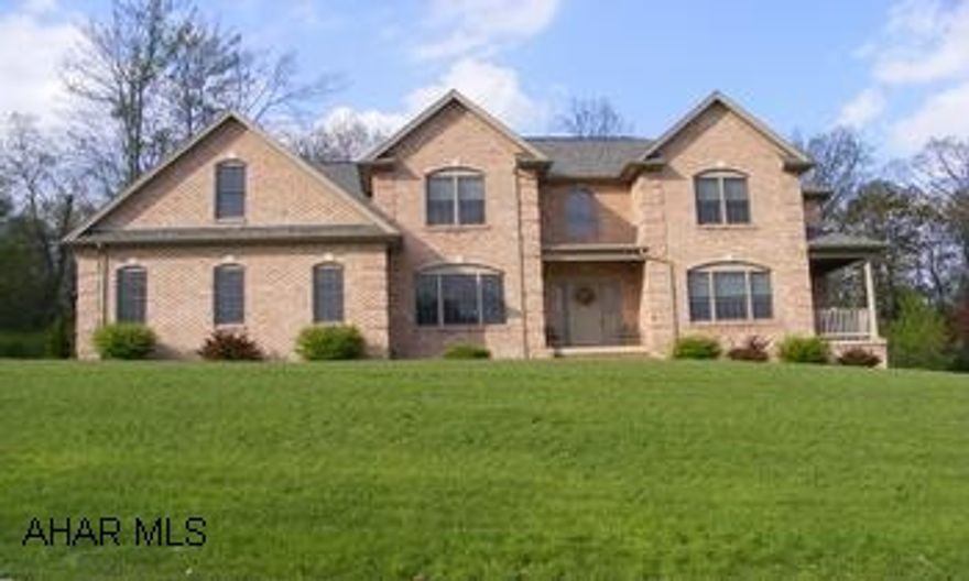 Over 4,000 square feet of living space in this wonderful custom built home with superior craftmanship and flowing floor plan. Beautiful hardwoods in the foyer, throughout  the eat- in kitchen, diining area,  stairway and laundry area. Cherry cabinetry,wall oven and warming drawer compliment the kitchen and serving area off the formal dining room. The sitting /living room has its own private covered side porch and the family room houses a beautiful black granite fireplace.The 2nd floor with its large open hallway features 4 bedrooms including a great master suite with garden jacuzzi tub and 2 huge walk-in closets.Finished lower level could be a separate living space with its recreation room ,exercise room and separate entrance and there is room for a kitchenette too.  2 large walk in closets in the other bedrooms. This custom home, built by Metz Builders, is situated on a lovely 0.77AC private wooded lot and features a 3 car garage, zoned heating and cooling and great screened porch. Call Dianne Stultz 329-1856.