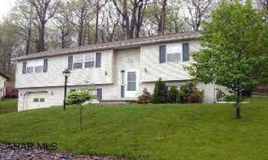 VINYL SIDED, RAISED RANCH WITH ATTACHED 1-CAR GARAGE. BEAUTIFUL 9-YEAR-OLD RAISED RANCH, TOTALLY MAINTENANCE-FREE EXTERIOR, SEMI-FINISHED BASEMENT, NICE REAR DECK, CENTRAL AIR, MASTERBEDROOM WITH MASTER BATHROOM, 2 BEDROOMS, FULL BATHROOM, 200 AMP BREAKERS AND ALL APPLIANCES.  GREAT VALUE, GREAT HOME.