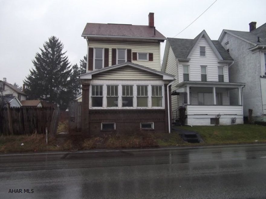 Property is being sold AS IS. 2 story home with 2-BR, 1-BA.