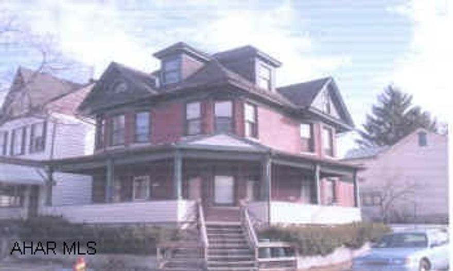 Brick duplex. Classic brick 2 unit.  Seperate water/sewer, seperate electric.  Wood floors and natural woodwork.