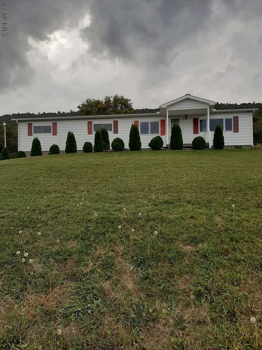 Are you looking for a affordable home with beautiful views? This home sits atop the hillside overlooking the valley. There is beautiful craftsmanship throughout the entire home. This is a very convenient location close to the major highways yet in the country. Very easy commute to Maryland and DC. A real deal if you're downsizing and also a wonderful choice for a first time home buyer!