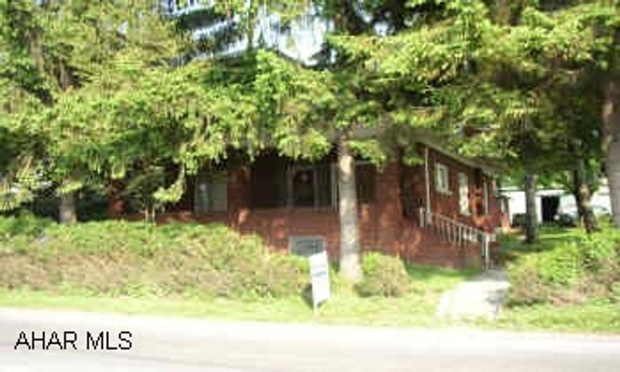 WELL BUILT BRICK 1.5 STORY. ZONED HIGHWAY BUSINESS. NEEDS COSMETIC WORK.