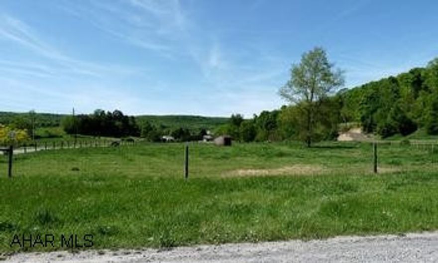 3.9+/-  acre level, cleared and perc approved building site - currently being surveyed and subdivided- Cleared and perc approved building site, partially fenced with small stream and over 900 feet road frontage is conveniently located along Pensyl Hollow Road near intersection with Rt. 30  Buyer to provide well and on-lot-septic system.