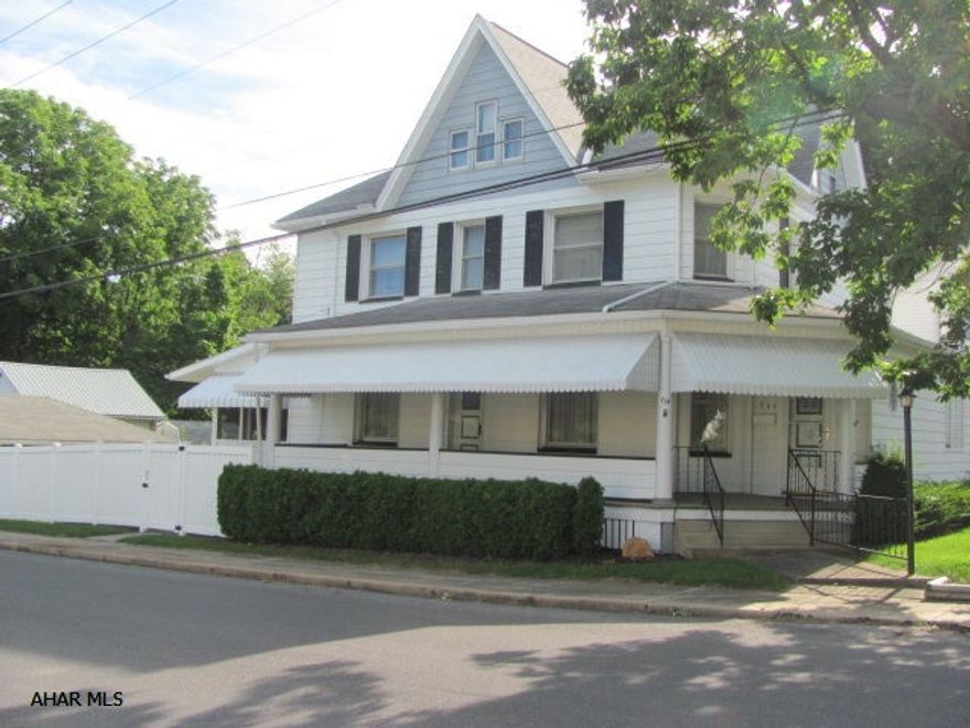 A well maintained home on corner lot with fenced in yard, carport and oversized detached garage. House  has a large area on first floor that could be an additional living room or bedroom.  House has a large eat in style kitchen. Screened in porch adjacent to the eat in  kitchen is a great feature.