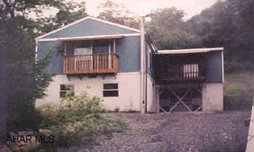Raised rancher. 2 bedroom, 1 car garage. Sold as is. Needs TLC.