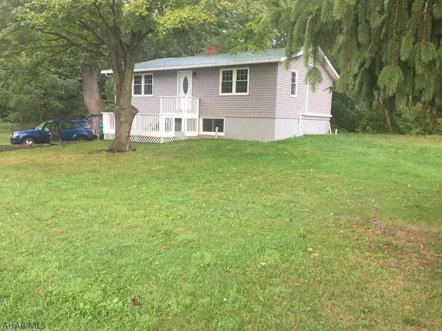 Completely renovated raised ranch home on .5 acres in Chestnut Ridge SD.