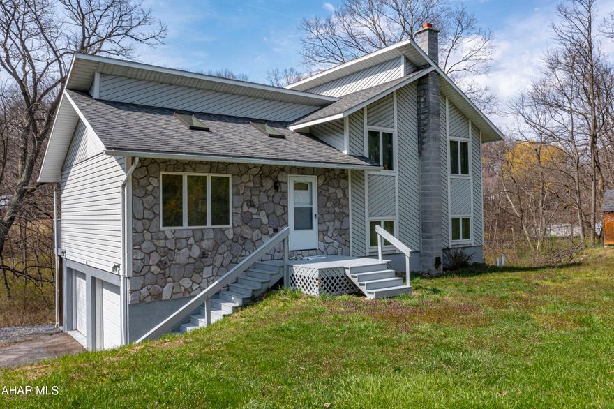 Escape the hustle and bustle of city life and discover serenity in this captivating tri-level home nestled in the picturesque landscape of Roaring Spring. Imagine sitting on the back deck, enjoying your moring coffee while embracing the lush greenery and overlooking a beautiful pond. This property offers a harmonious blend of comfort and nature's beauty. The 2 car garage offers plenty of room for cars, storage, and hobbies! You don't want to miss the opportunity to make this gem, that seamlessly blends indoor comfort with outdoor beauty your own!

**Offers will be accepted until 7PM 4/13/2024**