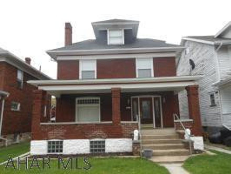 This is a large brick home with  2 parking spots in the rear and a 12x12 shed along with street parking in the front. Front and rear covered porches for convenient access. This home has been remodeled from top to bottom . The first floor features a kitchen, dining room, family room and living room with fireplace.(Please note, seller has not used the fireplace and does not know if it is in working order). The second floor has stunning original hardwood floor in all three bedrooms and a very large full bath. The attic can be used as extra living space or even another bedroom. The home has new windows. Walk into the basement from the outside and go to the bonus family room, utility room or spacious laundry room with half bath. This home is spacious, brick and very solid. Must see