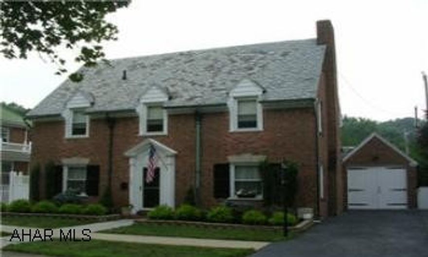 CHARMING ALL BRICK 3 BEDROOM (FINISHED 3RD FLOOR COULD BE 4TH BEDROOM), 2.5 BATH HOME ON A BEAUTIFULLY LANDSCAPED LOT.  QUAINT SUNROOM OFF THE LIVING ROOM.  HARDWOOD FLOORS, SECURITY SYSTEM, AND FIREPLACE.