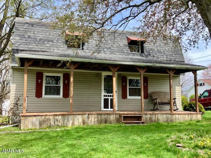 This charming property features a level 3/4-acre yard, a two-story home, and an oversized carport in the United School District. The 3-bedroom, 1.5-bath home is move-in ready, with vinyl siding and a covered front porch that opens to a spacious kitchen, complete with a handmade island and seating for four. A separate dining room boasts painted hardwood floors, while the large living room provides access to the back porch and playset. The first floor also offers a toilet, vanity, and washer/dryer hookups. Upstairs, you'll find a full bathroom and three comfortably sized bedrooms.