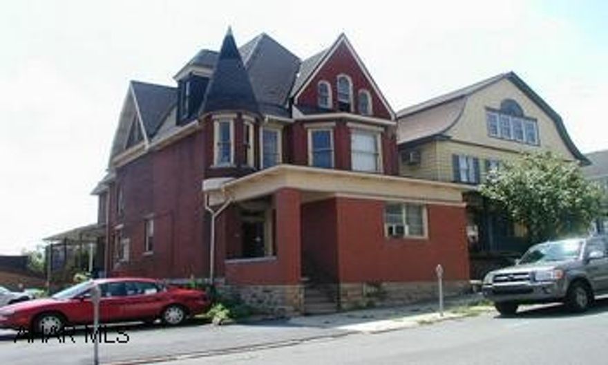 Great Bones!  Brick structure - semi-wrap porch 2 apartments and 1 efficiency. Fully occupied. Great Bones!  Brick structure - semi-wrap porch 2 apartments and 1 efficiency.  Fully occupied.  Seller has updated electric, foundation improvements.