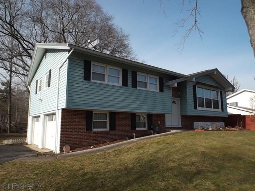 SELLER SAYS BRING OFFERS!!  Well maintained bi-level on a cul-de-sac in Tipton.   Gas HW heat and central A/C provides great temperature control throughout the year.  Lower level family room currently used as a fourth bedroom.  Newer thermopane windows throughout.   Patio and deck at rear of the property.   New water heater as of June, 2017.  SELLER WILL PAY first year's flood insurance premium which has been estimated at $650/year.