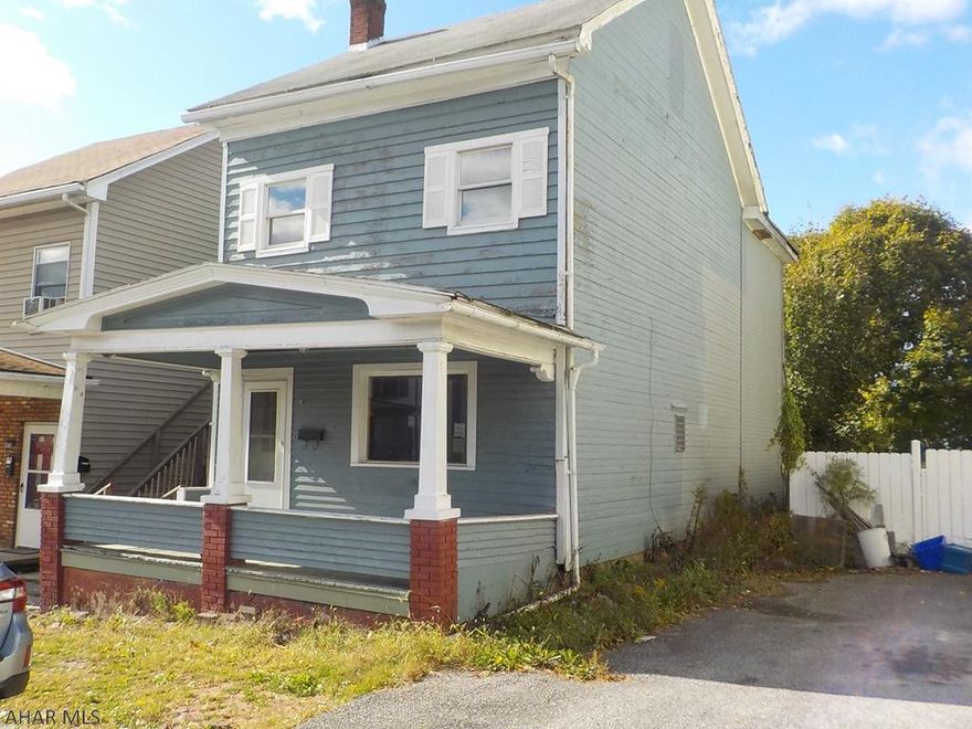 Handyman special or investor!  Priced to sell!  3 BR, 1.5 bath, fireplace between LR & DR. 1st floor laundry.  Off street parking & 1 car garage.