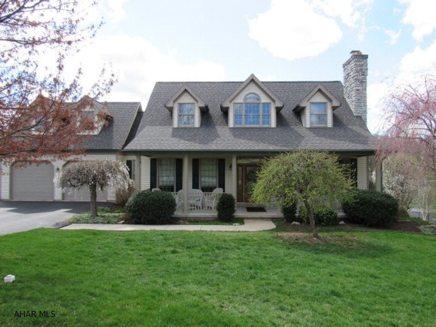 This magnificent 4BR,2 BA home has just the perfect floor plan & as you walk up to the large front porch & open the door to see the LR with its stone FP & Columns to the DR & hardwood floors it's breathtaking!The kitchen is open with beautiful oak cabinets and under cabinet lighting & off the kit nook there is a 3 season sunroom & a 13'6x22' Deck.The 1st Flr MBR has a beautiful ensuite. The 2nd Flr has a bonus room/4th BR above the garage with a back staircase accessible to the hallway leading to the garage/ kitchen area. This home has a 2 car garage & a 3rd garage underneath to store your seasonal furnishings and also have a workshop.The lwr lvl has a huge FR, LR, 17'11x18'8 Utility Rm with a built in dehumidifier for basement.Every rm is bright & spacious through out!Lots of Storage