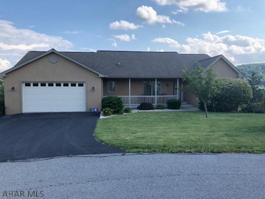 Spectacular 1 story 3 Bedroom 3 Bath open floor plan with loads of updates like Crown Molding throughout, formal Dining Room with decorative Columns and detailed chair molding.  Hardwood floors in kitchen, Dining and Living Rooms.  Spacious kitchen with Island. maple cabinetry with under cabinet lights and tiled backsplash.  Split bedroom floor plan with Master on one side and bedrooms on other end.  Covered rear deck with views of country side.  Finished basement with 3/4 bath, large family room with 150 inch projection screen TV also a finished bonus room could be used as a Bedroom/Office and has a walk-in closet.  Utility room with overhead garage door on lower level to store mower, tools, ATV, etc.  Also 2 car heated attached garage on main level with epoxy floor.  All furniture is neg