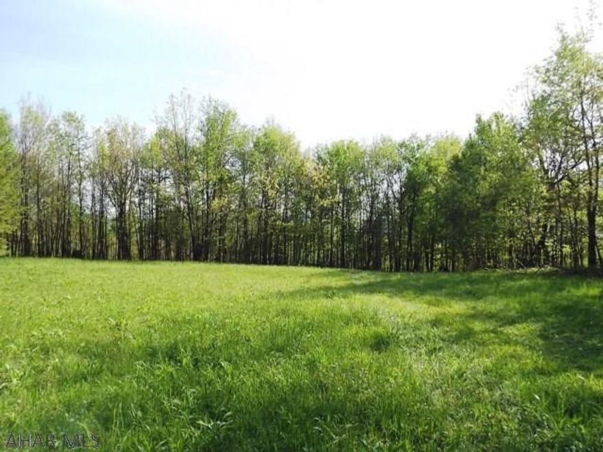 Build your retreat on this 3.24 acre lot at the end of a cul-de-sac. Wooded, flat and views! In an area of fine homes. Conveniently located between Bedford and Johnstown. Close to all amenities.