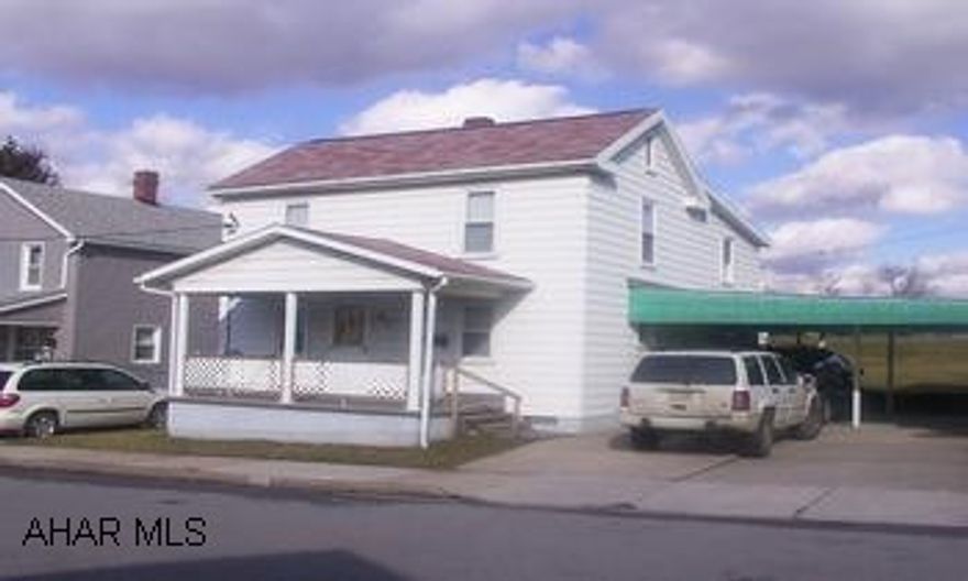 Sharp 4 bedroom.  New vinyl windows, aluminum siding, updated wiring, carport, large level lot.  All appliances.