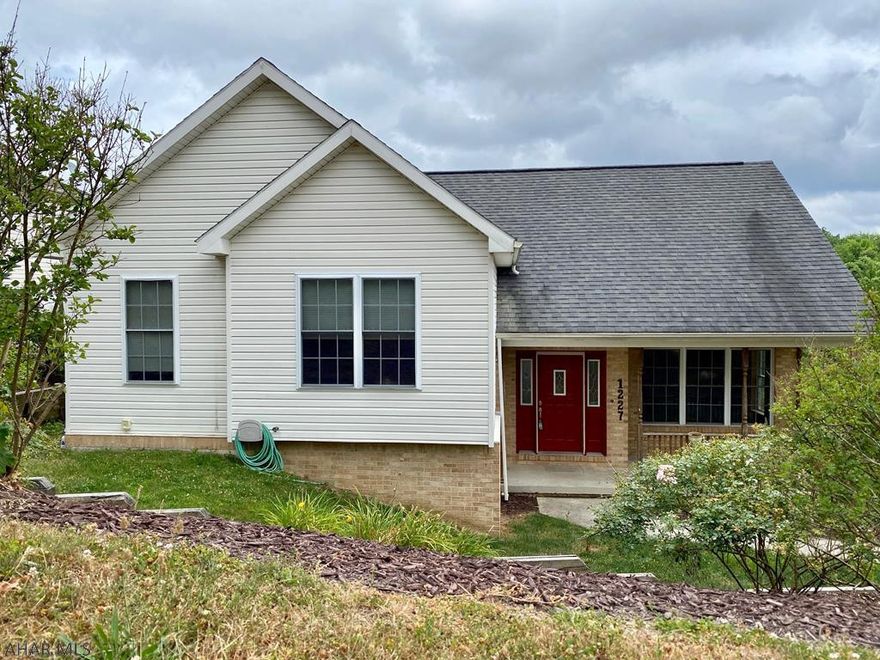 4 Bedrooms and 2.5 baths in this 4 level multilevel in popular Calvert Hills. Built in 2001, this home features new carpet on 2nd floor, new paint throughout,& a new furnace & C/A. There is so much living space with the wide open floor plan on the main level and the huge finished family room on the lower level. Large master bedroom has master bath and a walk-in closet. 2 of the other 3 bedrooms have walk-in closets too! New carpet on 2nd floor and 3rd floor is a nice big finished 4th bedroom. New 1/2 bath and an office area in the lower level, plenty of closet space, and an oversized 2 car integral garage. 2 decks out back and a view that will leave you breathless. See it today!