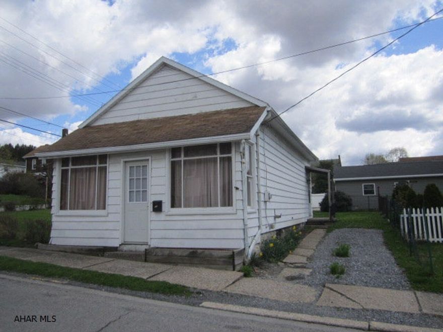 Cute bungalow perfect for downsizing. Remodeled interior with wood laminate flooring and custom ceramic tiled bathroom. Full basement & off street parking.