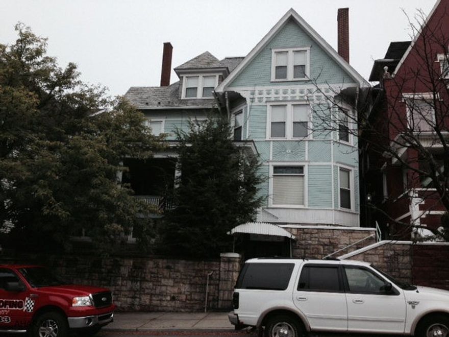 This one of a kind home offers a grand foyer and a beautiful staircase. Crown molding & beveled glass. Large rooms with hardwood floors. So much character and charm. 2nd Floor laundry and plenty of built-ins. 3 Full finished floors plus attic!! And a partially finished basement. Many possibilities for this very large and charming home.