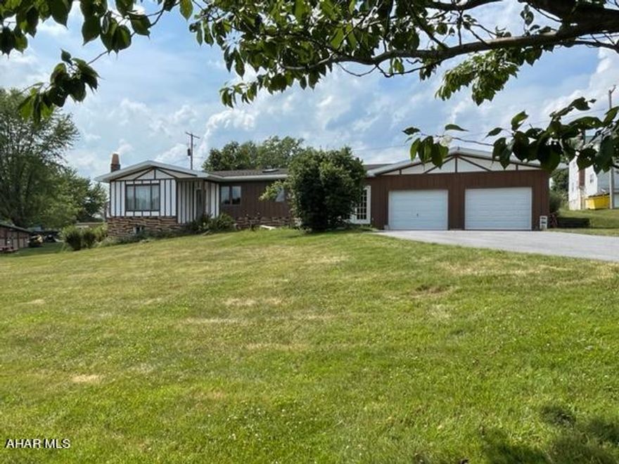 This beautifully maintained property is sitting on a corner lot in Chest Springs. You enter the home through the large breezeway which would be perfect as a private sitting area and a place for coats and shoes. The bright renovated kitchen has many unique features, such as the seashell countertops, trey ceilings, new sky lights, Brazilian hardwood flooring, and beautiful cabinets. The dining area attached makes it perfect for entertaining guests. Relax in the evening in the spacious living area. Both bedrooms have plenty of closet space, a full bath with jacuzzi tub and a third bedroom was converted into a first floor laundry with storage room, you could convert it back if you choose. The basement was once used as a family room and bonus room, there is a 3/4 bath and a canning kitchen in the basement. The furnace was installed in 2017 newer oil tanks, newer roof outside was stained last year. Store your vehicles in the 3 car garages!!! Call today to schedule your showing!